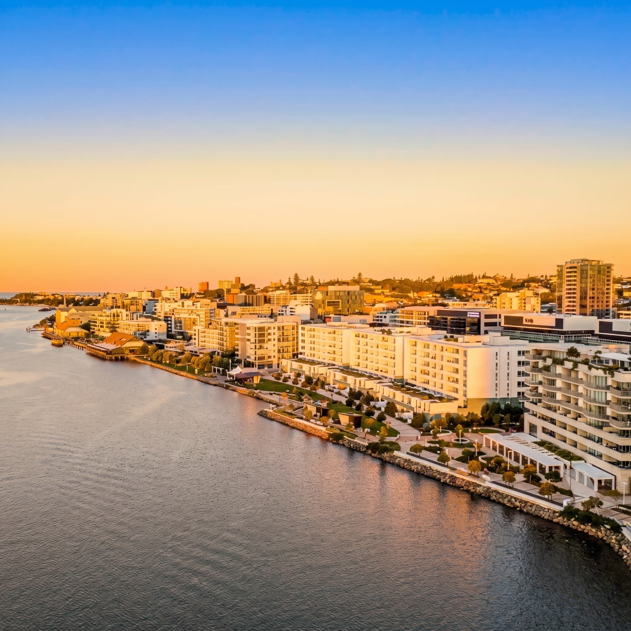 Waterfront apartments on the Honeysuckle foreshore at golden hour